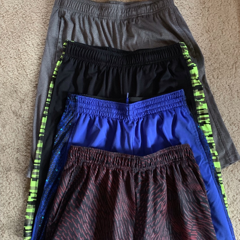 Set of 4 shorts. Boys size Large.